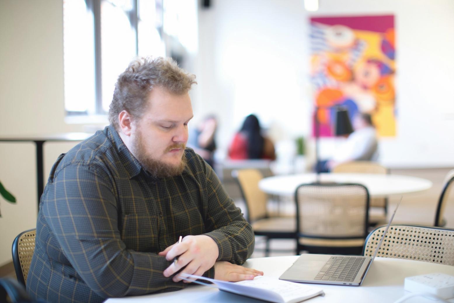 Financial education classroom setting with engaged participants